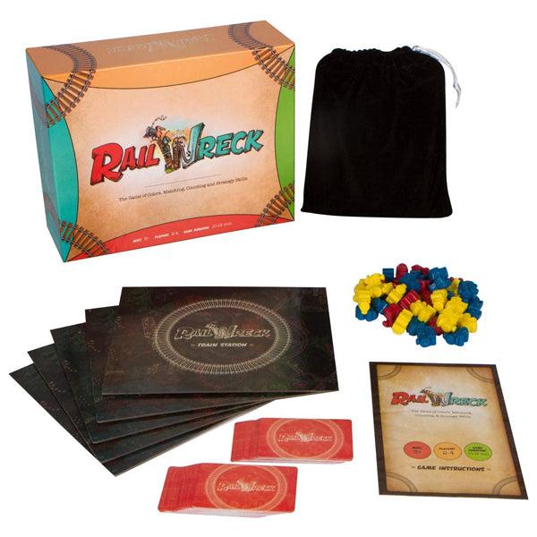The image displays the Inspiration Play Rail Wreck Kids Train-Themed Board Game by Inspiration Play, including the game box, instructions, cards, colorful pieces, player boards, and a black storage bag arranged on a white surface.